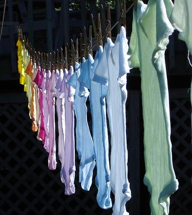 Onesies hanging on line